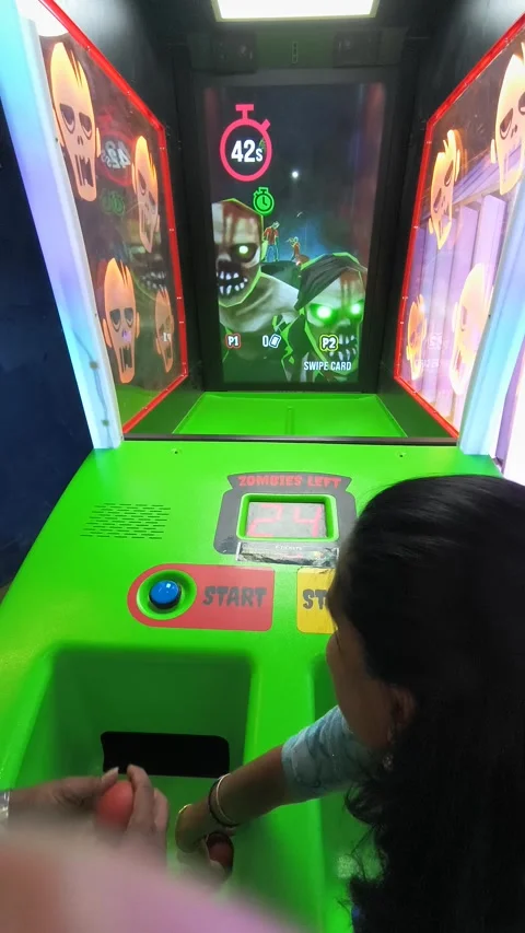 Interactive arcade shooting game machine with colorful targets and dual player Stock Footage 331461102