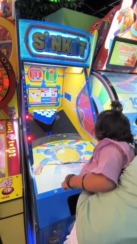 Interactive arcade shooting game machine with colorful targets and dual player Stock Footage 331461200