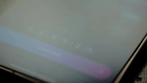 Interactive counter and a CONTINUE button displayed on mobile phone screen Stock Footage 326945194
