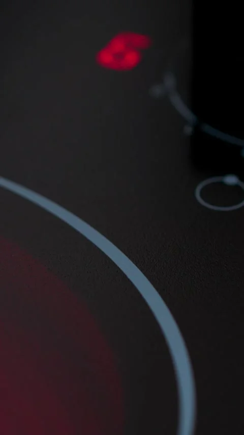Interactive Display Of Advanced Kitchen Appliance With Illuminated Heating Zone Stock Footage 327095599