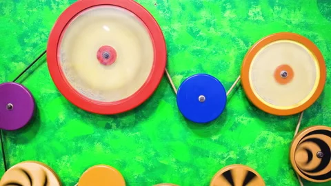 Interactive exposition in science museum for kids with colored rotating wheels Stock Footage 168024011