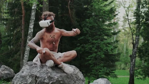 Interactive Game in Virtual Reality Space. Ancient Primeval Human Driving Car Stock Footage 130905394