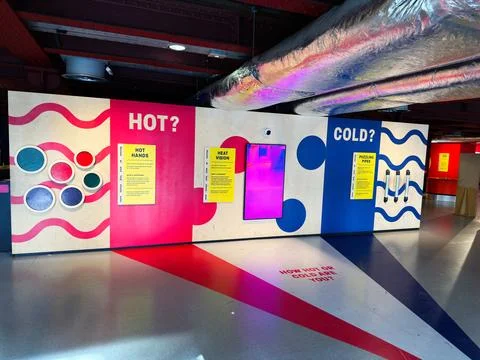 Interactive hot and cold science exhibit with heat vision display and hands.. Stock Photos
