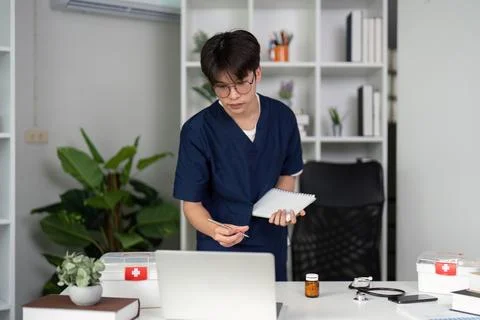 Interactive Learning and Collaboration. A medical student actively engages in Stock Photos