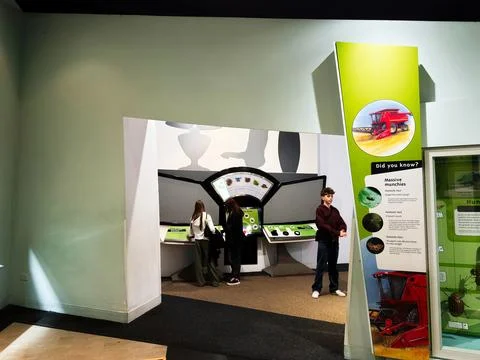 Interactive museum exhibit with children and teenager exploring agricultura.. Stock-Fotos