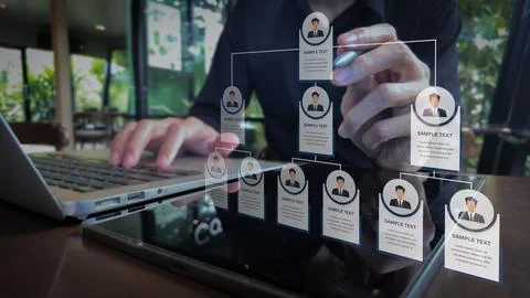 Interactive Organizational Chart with Tablet and Laptop in Business Environment Stock Photos