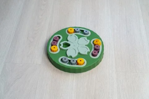 Interactive puzzle where to hide dried treats and cheese to train dog's sen.. 写真素材