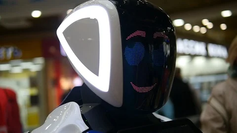 Interactive robot in the mall, helps people navigate in space Stock Footage 97006462