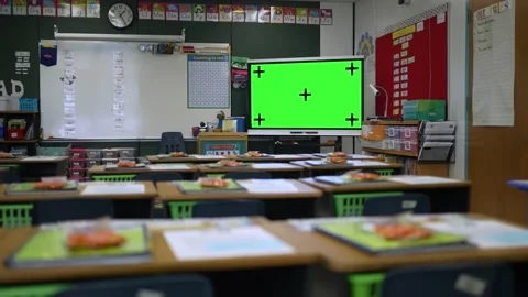 Interactive white board with green screen chroma key in empty school classroom. Stock Footage