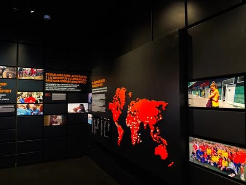 Interactive world map exhibition wall with photos and social project displa.. Stock Photos