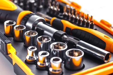 Interchangeable screwdriver set with different types of metal steel heads and Stock Photos