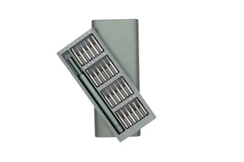 Interchangeable screwdriver set with different types of metal bits Foto stock