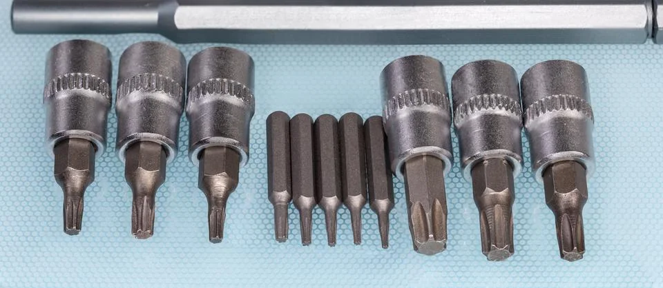 Interchangeable torx bits for screwdriver and mini screwdriver close-up Foto stock