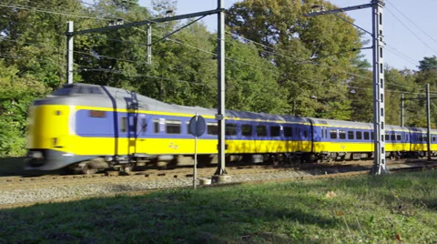 Intercity appears from behind the trees Stock Footage 32281342