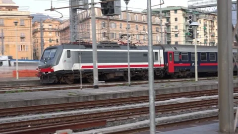 Intercity Night Train with two E464 locomotives of Trenitalia arrives in Gen Stock Footage 291818361