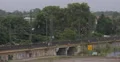 Intercity Train Departing German Landscape Countryside Scenery Bridge Crossing 4k or 4k+ Resolution