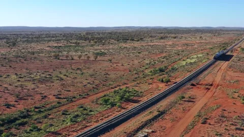 Intercity train on railway road of Broken Hill in Australian outback desert 4k. Stock Footage 168034893