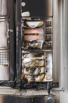 Intercom burned An intercom system of a building, on fire by vandals. Copy... Stock Photos