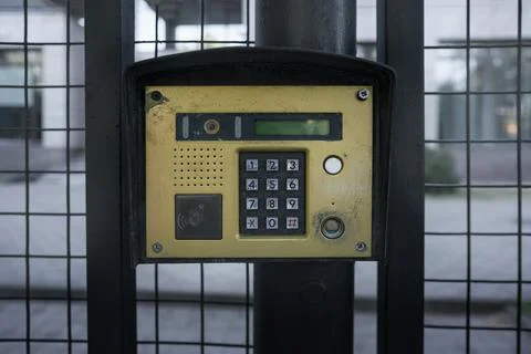 Intercom is electrical device allowing one-way or two-way communication. Stock Photos