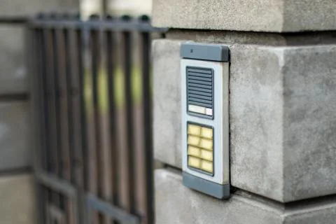 Intercom on a stone fence, intercom on the street Stock Photos
