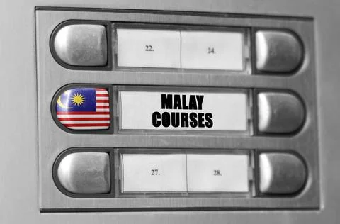 On the intercom there is a button with the flag of Malaysia and the inscrip.. Stock Photos