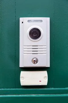 An intercom with a video camera and a microphone for voice. Stock Photos