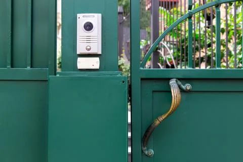 An intercom with a video camera and a microphone for voice. Stock Photos