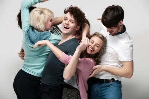 Interconnected group of young adults Stock Photos