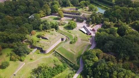 Interconnected moats angular earthen ramparts curved brick bastions fortified Video stock 327946034