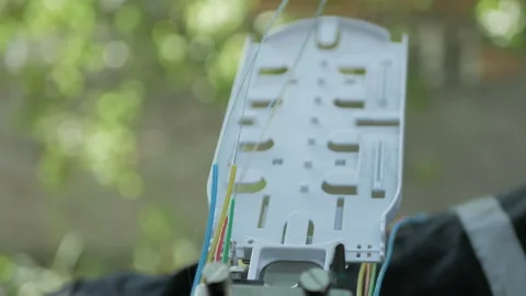 Interconnecting the optical cable of the Internet Stock Footage 151038466