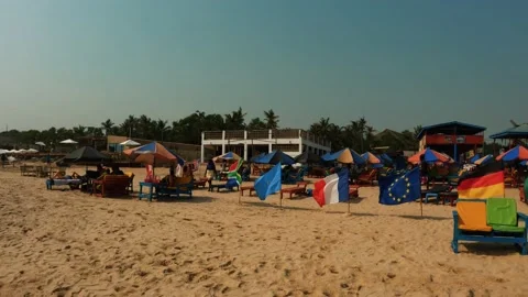 "INTERCONTINENTAL FLAG DISPLAY: A BEAUTIFUL BEACH FLYING FLAGS" Stock Footage 229127640