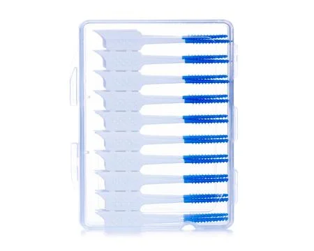 Interdental tooth brushes in hand Stock Photos
