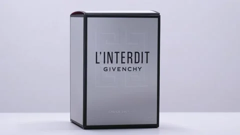 Interdit by Givenchy. Box with Perfume bottle rotation in studio Video stock 171626833