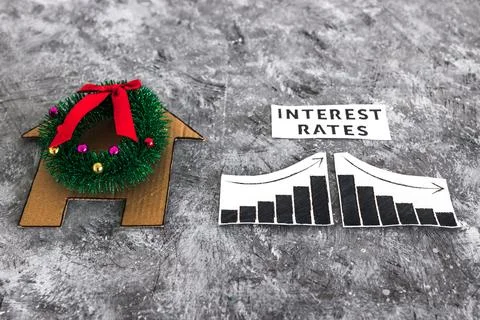 Interest Rates text and graph with stats going up and down next to cardboar.. 写真素材