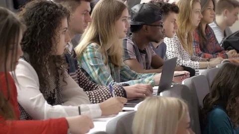 Interested multi-ethnic college students listening in a lecture 스톡 동영상 69928179