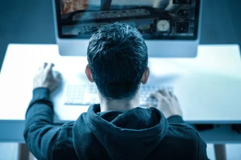 Interested young man testing new computer game Stock Photos