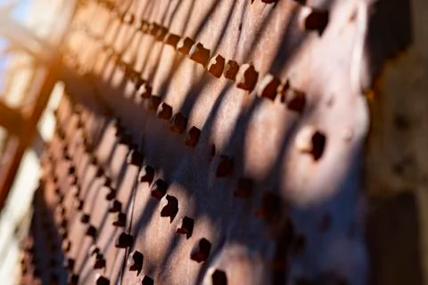 Interesting abstract background with shadow from iron gate pattern Stock Photos