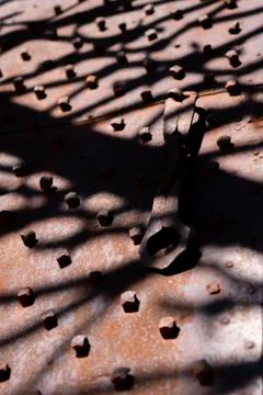 Interesting abstract background with shadow from iron gate pattern 스톡 사진