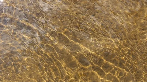Interesting and unusual patterns on the surface of the water. Video stock 113723851