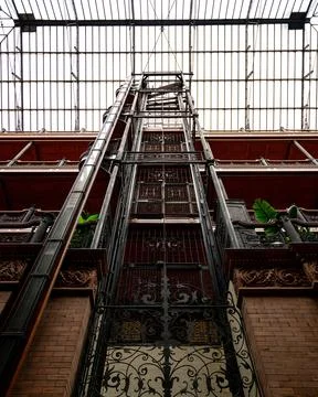Interesting architecture of elevator inside of a train station filled with na Stock Photos