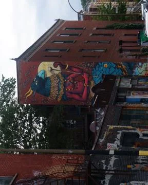 Interesting artwork on side of the building Stock Photos