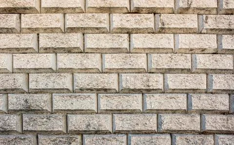 Interesting beige bricks in organized rows, perfect for texture or background 写真素材