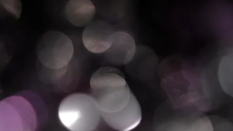 Interesting color video of multi-colored bokeh in black Vídeo Stock 318202673