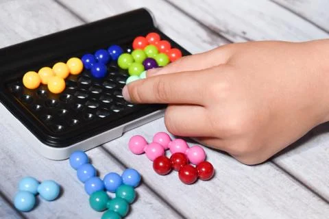 Interesting game for children to develop memory and intelligence. Stock Photos