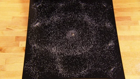 Interesting patterns created due to sands reaction to audio waves Stock Footage 99054281