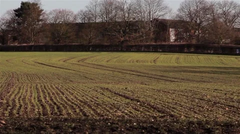 Interesting Patterns on Farmed Plowed Field Lines Stretch Away - Cultivated Soil Stock-Footage 48987857