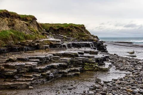 Interesting rock formations at the cliffs surrounding Kilkee, Ireland Stock Photos