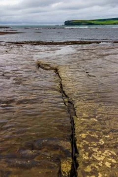 Interesting rock formations at the cliffs surrounding Kilkee, Ireland Stock Photos