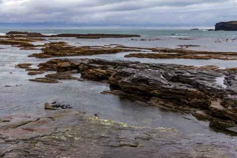Interesting rock formations at the cliffs surrounding Kilkee, Ireland Stock Photos