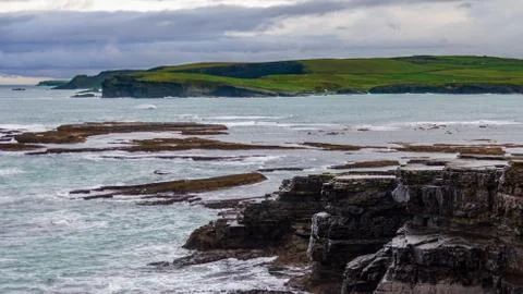 Interesting rock formations at the cliffs surrounding Kilkee, Ireland Stock Photos